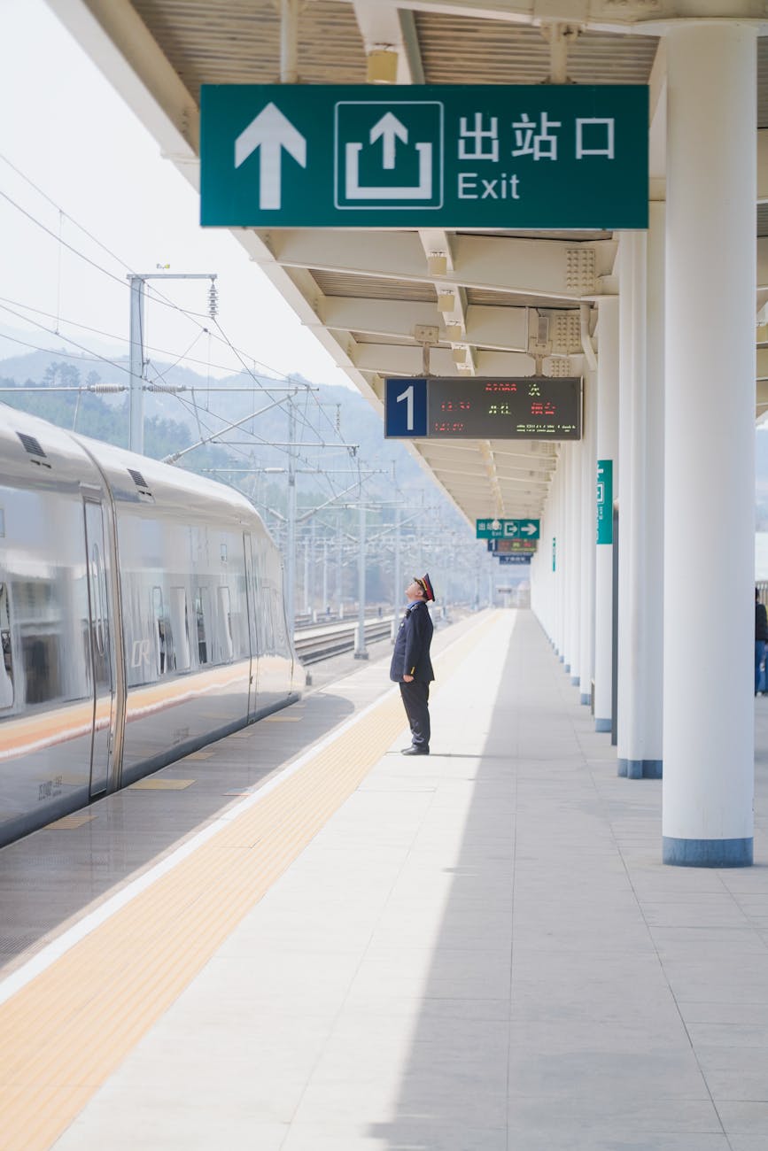 high speed train station with passenger waiting